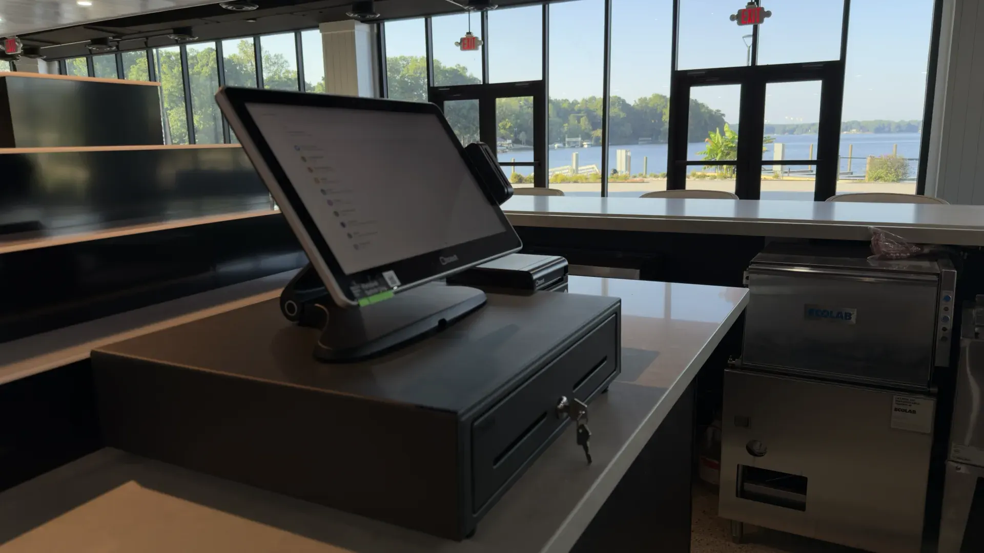 Toast POS terminal at Vitale Lakeside with Lake Norman visible through the windows